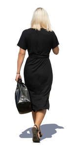 woman in a black dress walking