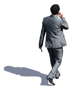 black businessman walking seen from above