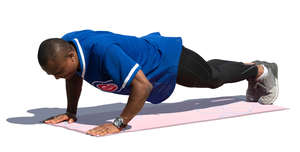 man doing pushups