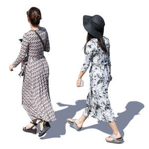 two women in summer dresses walking seen from above