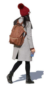 asian woman in an autumn coat walking