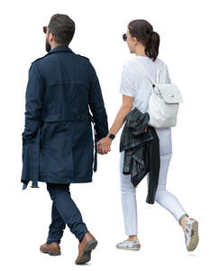 man and woman walking holding hands