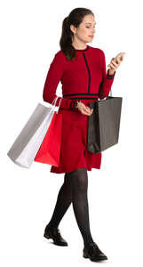 woman with shopping bags walking