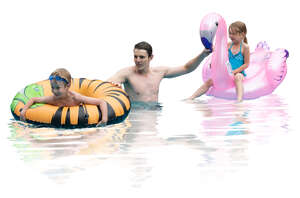 family playing in the pool