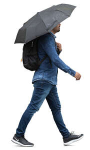 man with an umbrella walking