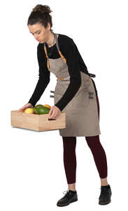 market worker carrying a crate of fruits