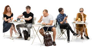 group of people sitting in a cafe