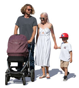 family with baby carriage walking hand in hand