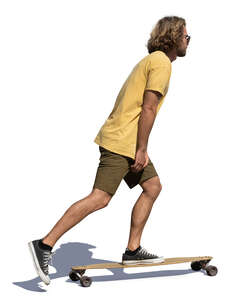 young man riding a longboard