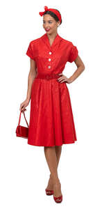 woman in a vintage red dress standing