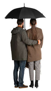 couple standing under un umbrella