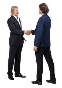 two men in suits shaking hands