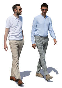 two men walking and talking on a summer day