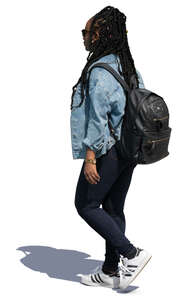 black woman with a backpack walking