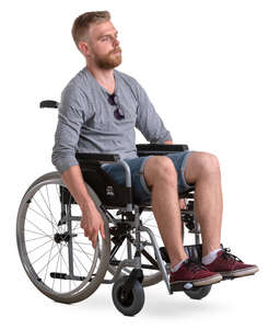 young man sitting in a wheelchair