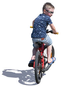 little boy riding a bike