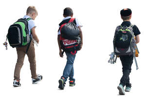 group of three boys with backpacks walking