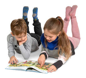 two kids reading a book on the floor