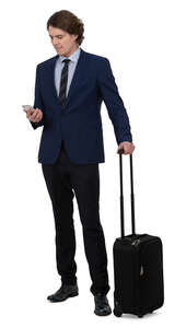 young businessman with a suitcase standing