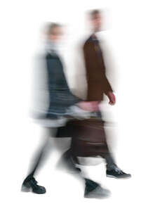two motion blurred people walking