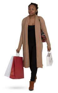 woman with shopping bags walking