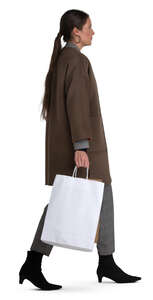 woman with shopping bags walking