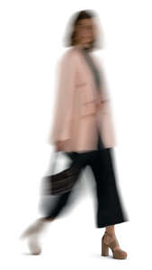 motion blur image of a woman walking