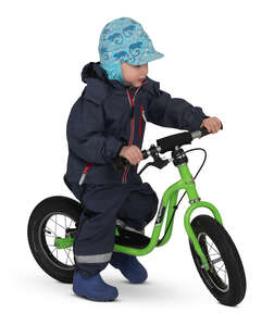 little boy riding his bike