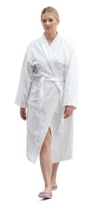 woman in a spa bathrobe walking