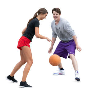 man and woman playing basketball