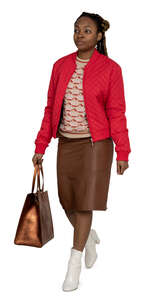 black woman in red jacket walking