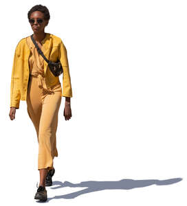 woman in a yellow costume walking