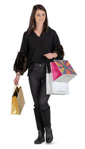 happy woman with shopping bags walking