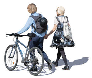 young man with bicycle walking hand in hand with a woman