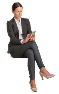 businesswoman sitting and texting