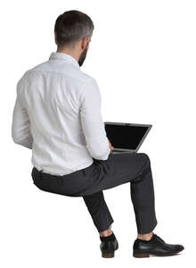 businessman sitting with a laptop on his knees