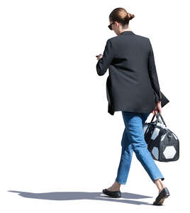 woman walking hastily on a street