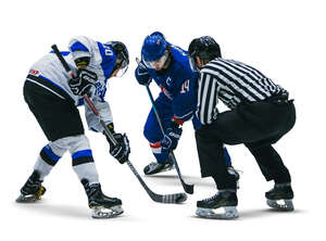 men playing hockey