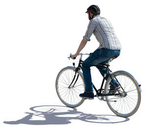 backlit man riding a bike