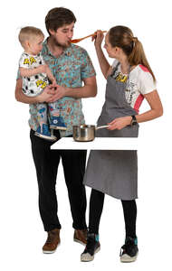 family cooking dinner in the kitchen