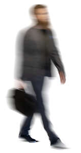 motion blur image of a man with a bag walking