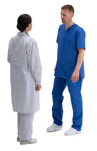 two medical workers standing and talking