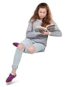 teenage girl sitting and reading a book