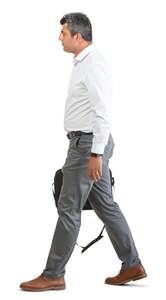 middle-aged businessman walking