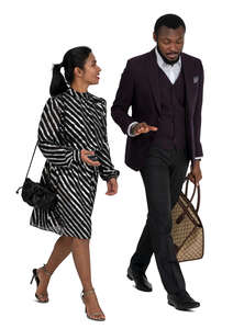 black man and indian woman walking and talking