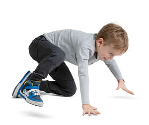 little boy playing on the floor