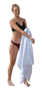 woman drying herself with a white towel