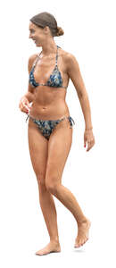 smiling woman in a bikini walking
