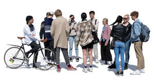 large group of teenagers standing and talking