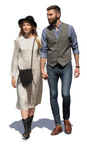 man and woman walking hand in hand